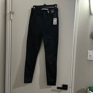 Black Skinny Curvy Push Up Jeans with a shine to them Size 5/27